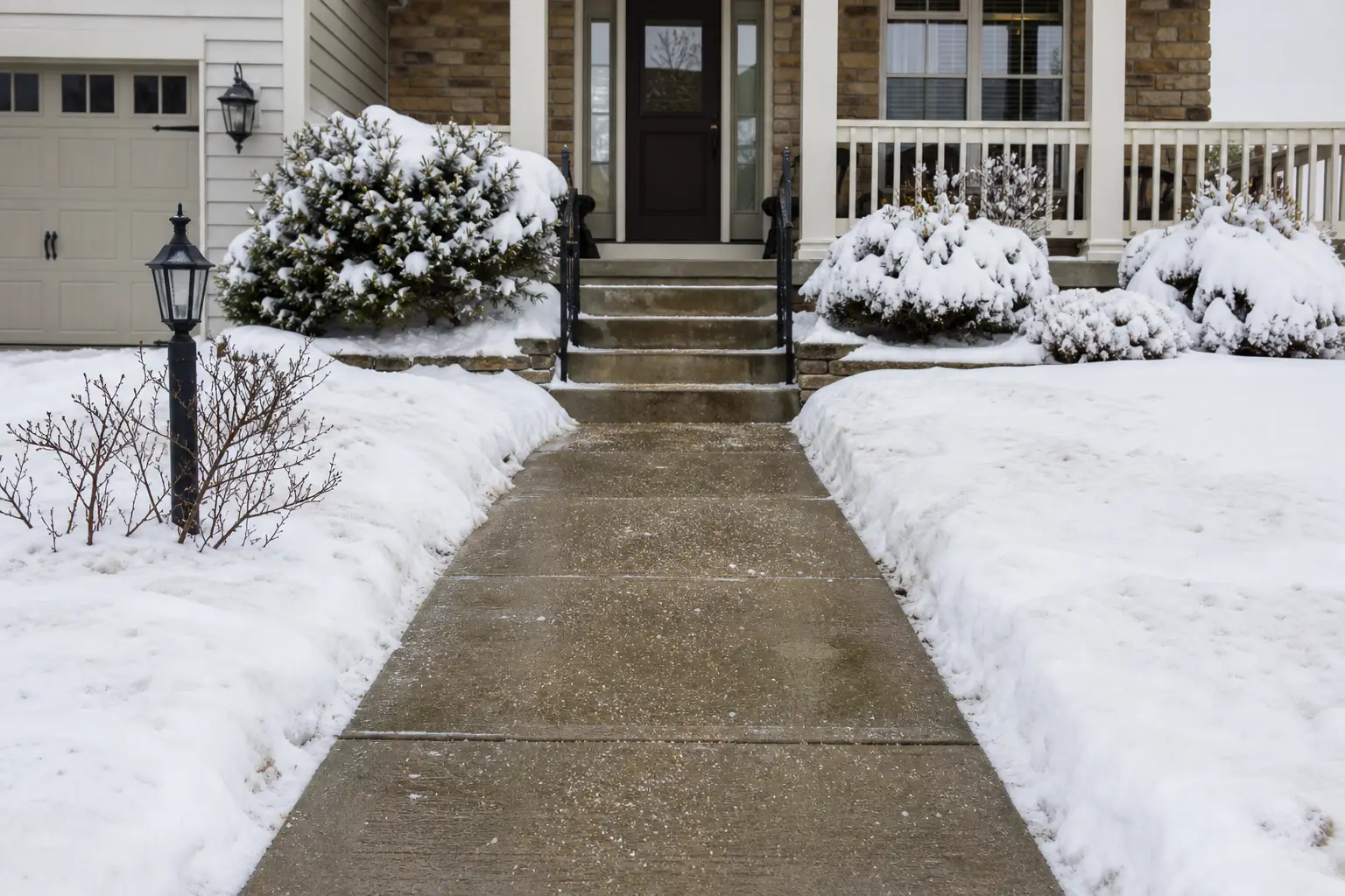 Cleared sidewalk to a Rochester front door